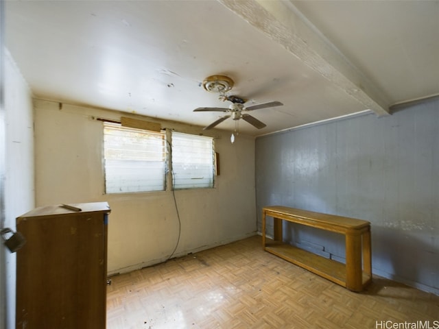 empty room featuring light parquet flooring and ceiling fan