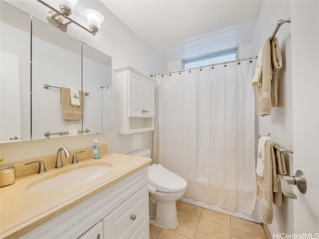 full bathroom featuring tile patterned floors, toilet, and vanity