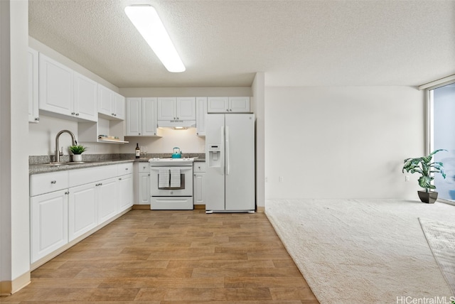 kitchen with light hardwood / wood-style floors, sink, white cabinets, a textured ceiling, and white appliances