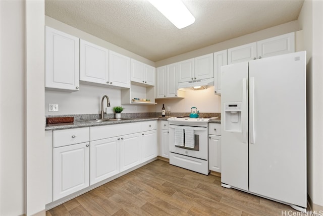 kitchen with white appliances, sink, white cabinetry, a textured ceiling, and light hardwood / wood-style floors