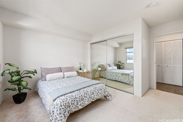 bedroom with a closet and carpet