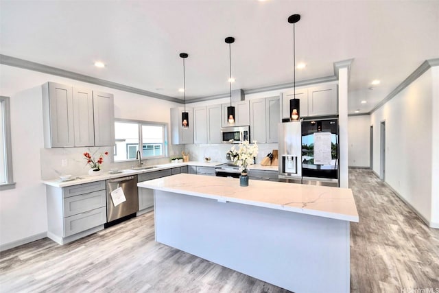 418 Halemaumau St, Honolulu, HI 96821 - kitchen featuring stainless steel appliances, gray cabinets, a sink, light stone counters, and ornamental molding
