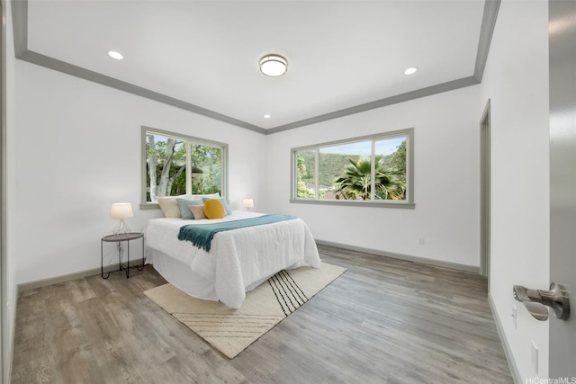 418 Halemaumau St, Honolulu, HI 96821 - bedroom featuring ornamental molding, baseboards, wood finished floors, and recessed lighting