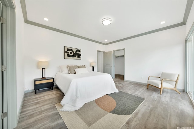 418 Halemaumau St, Honolulu, HI 96821 - bedroom with ornamental molding, wood finished floors, baseboards, and recessed lighting