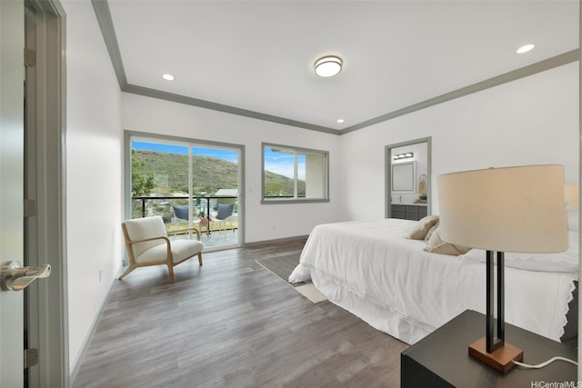 418 Halemaumau St, Honolulu, HI 96821 - bedroom featuring baseboards, ornamental molding, wood finished floors, access to outside, and recessed lighting
