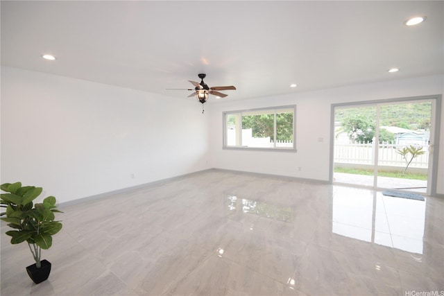 418 Halemaumau St, Honolulu, HI 96821 - unfurnished room featuring ceiling fan, recessed lighting, baseboards, and light tile patterned flooring