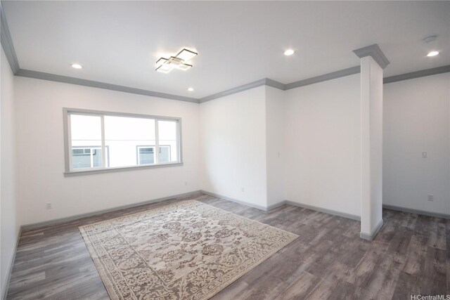 418 Halemaumau St, Honolulu, HI 96821 - empty room with crown molding, baseboards, wood finished floors, and recessed lighting