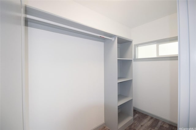 418 Halemaumau St, Honolulu, HI 96821 - spacious closet featuring dark wood-type flooring