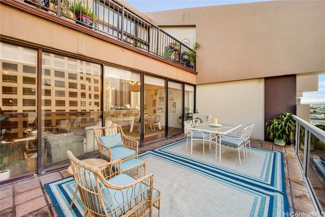 view of patio with a balcony