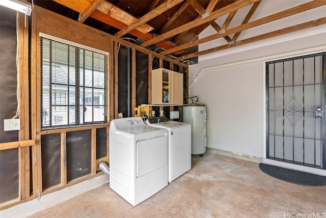 laundry area featuring washer and dryer and electric water heater