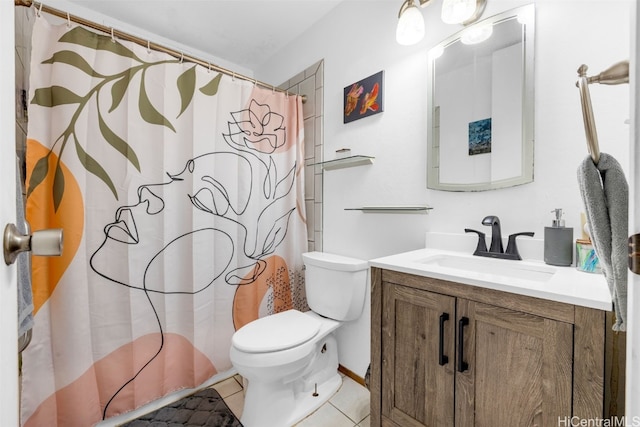 bathroom featuring vanity, toilet, tile patterned floors, and curtained shower