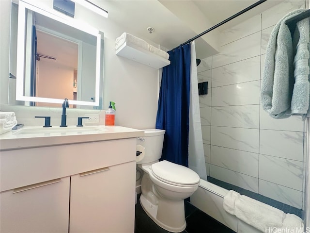 bathroom featuring vanity, toilet, and a shower with curtain