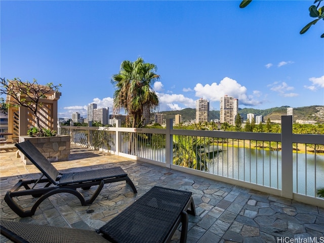 view of patio / terrace with a water view