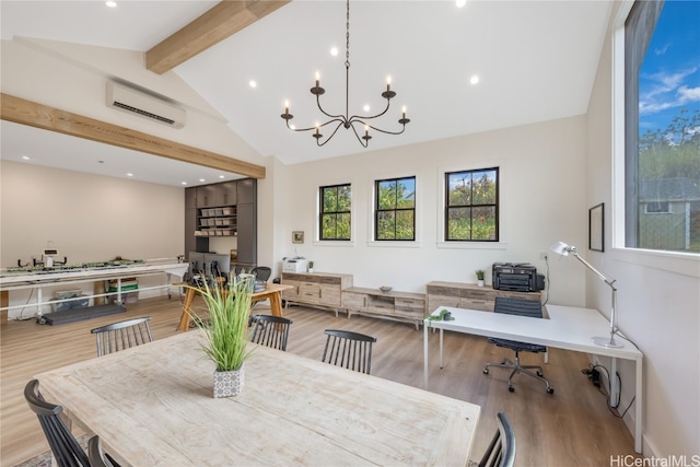 dining area with a wall unit AC, an inviting chandelier, high vaulted ceiling, light wood-type flooring, and beamed ceiling