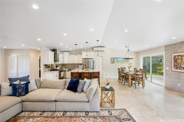 tiled living room featuring lofted ceiling and a notable chandelier