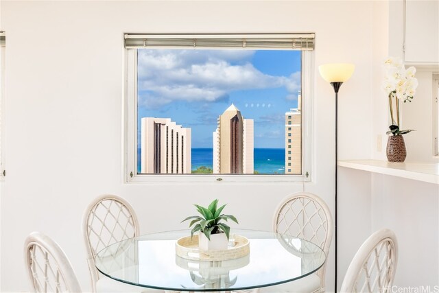 dining area featuring a water view