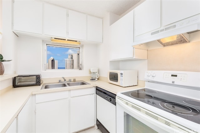 kitchen with custom range hood, sink, white cabinets, a textured ceiling, and white appliances