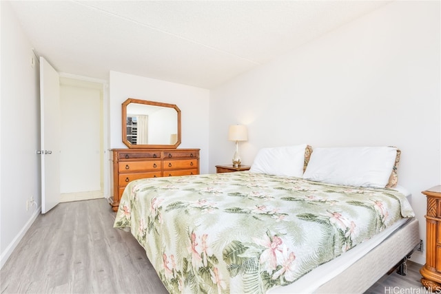 bedroom featuring light hardwood / wood-style floors