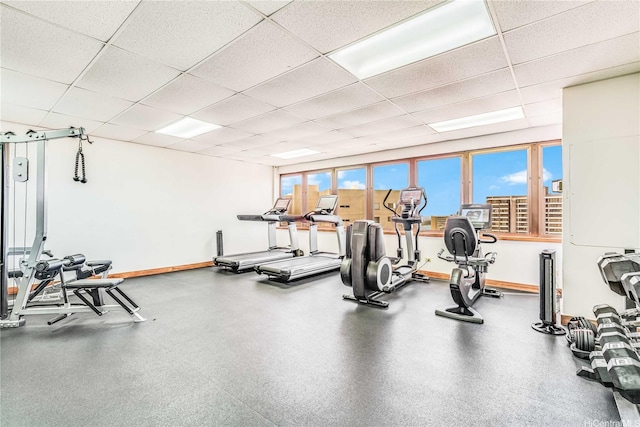 400 Hobron Ln Unit 3101, Honolulu, HI 96815 - workout area with a paneled ceiling and baseboards
