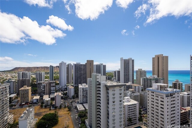 property's view of city featuring a water view