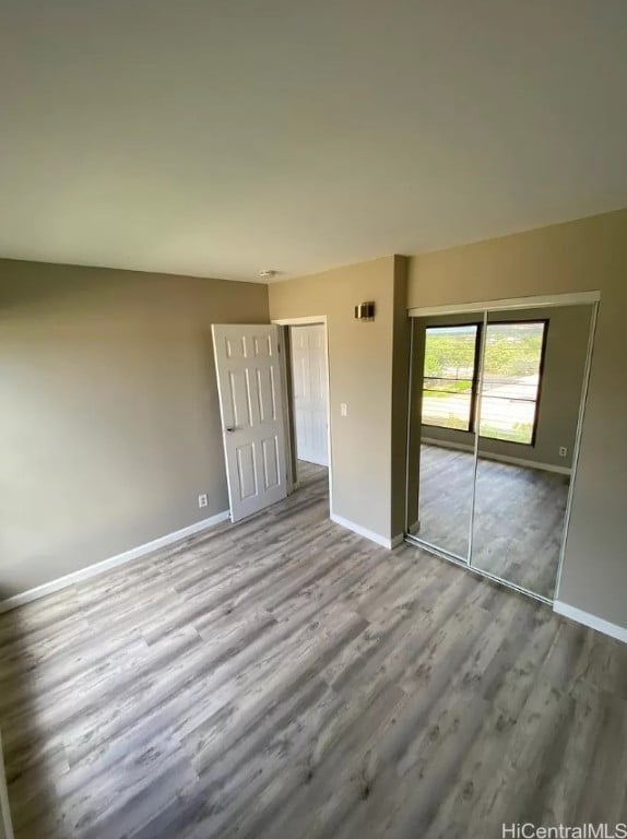 unfurnished bedroom featuring light hardwood / wood-style flooring