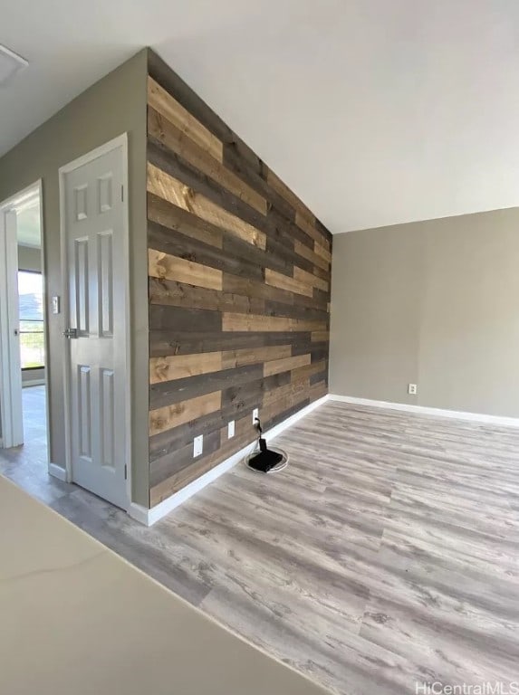 interior space featuring wooden walls