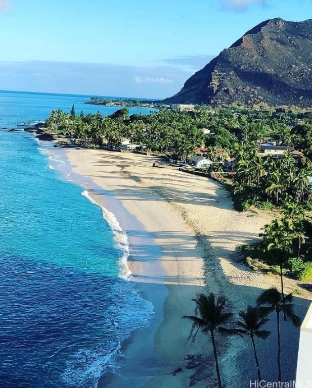 property view of water with a mountain view and a beach view