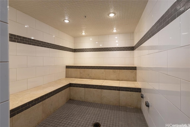 bathroom featuring tile walls and tile patterned flooring