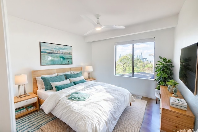 bedroom featuring ceiling fan and wood-type flooring