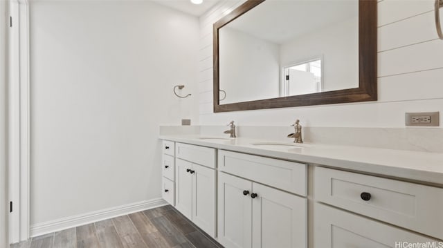 bathroom featuring vanity and hardwood / wood-style flooring