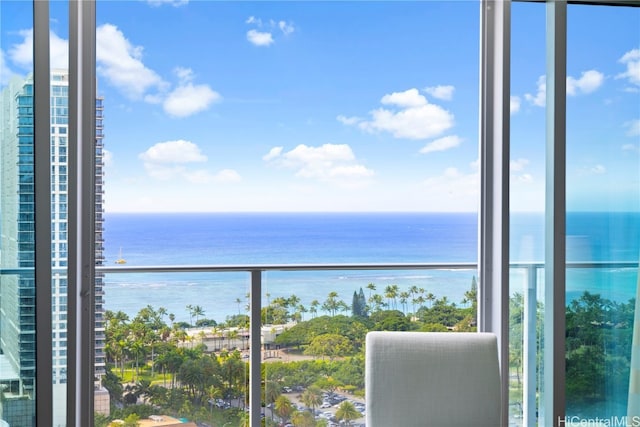 balcony featuring a water view