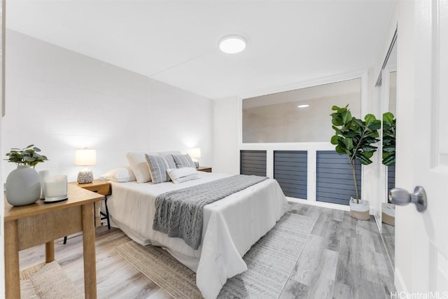 bedroom featuring light hardwood / wood-style flooring