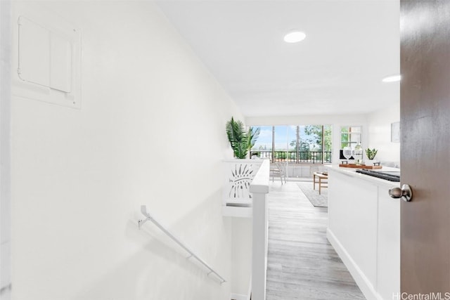 corridor featuring light hardwood / wood-style floors