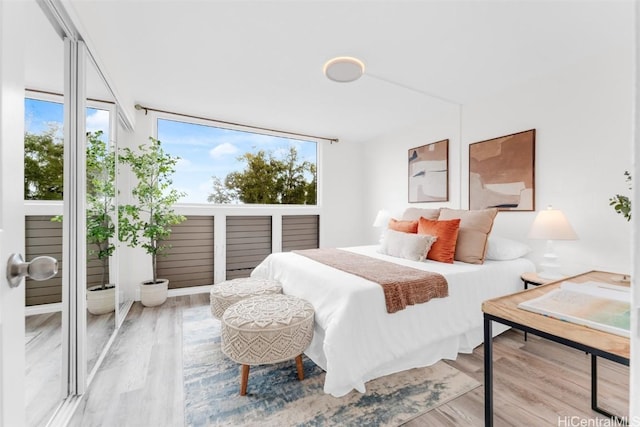 bedroom featuring light wood-type flooring