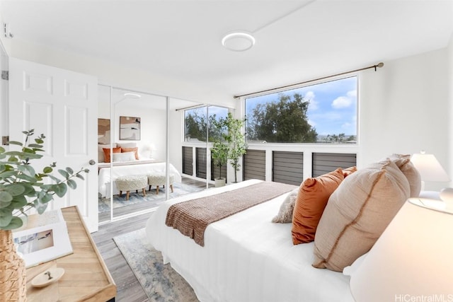 bedroom with wood-type flooring