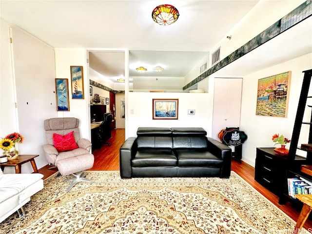 living room with dark wood-type flooring