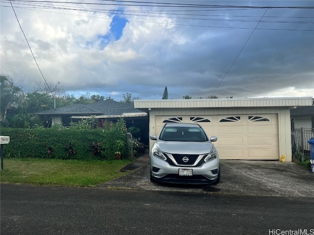 view of front of property featuring a garage