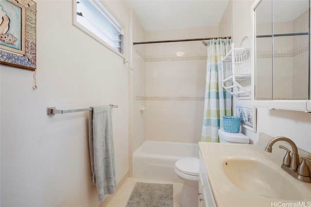 full bathroom featuring shower / bath combo, vanity, and toilet