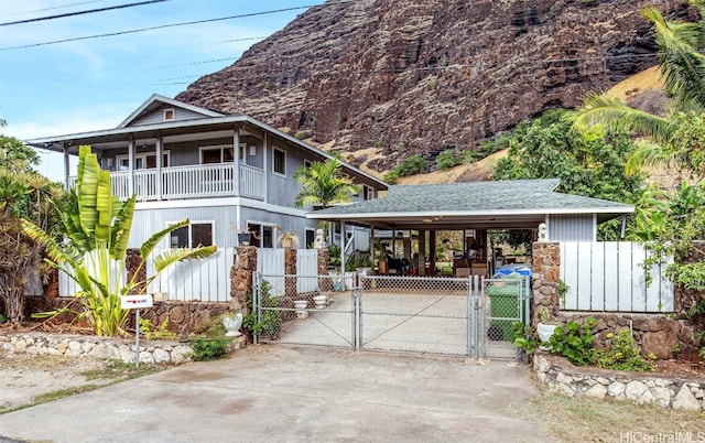 view of front of house with a balcony