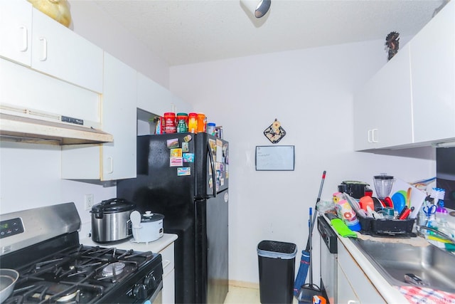 94-1259 Lumikula St Unit 4U, Waipahu, HI 96797 - kitchen with gas range, white cabinets, and exhaust hood