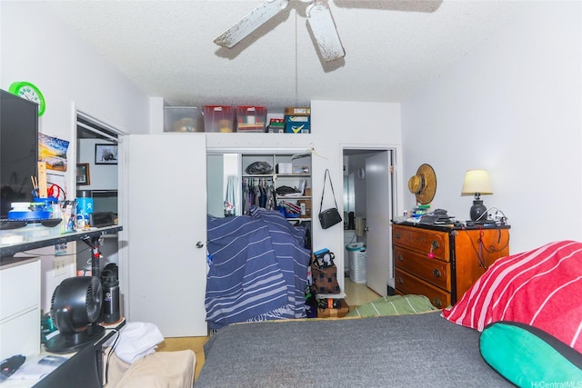 94-1259 Lumikula St Unit 4U, Waipahu, HI 96797 - bedroom featuring a textured ceiling, a closet, and ceiling fan