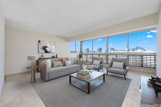 carpeted living room featuring a textured ceiling