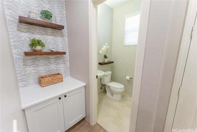 bathroom featuring toilet