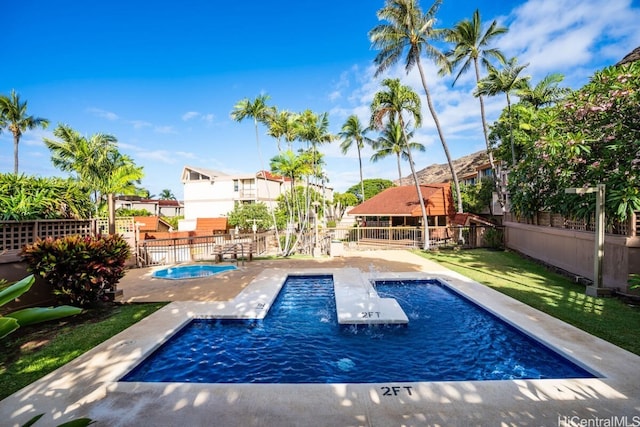 view of swimming pool featuring a patio area