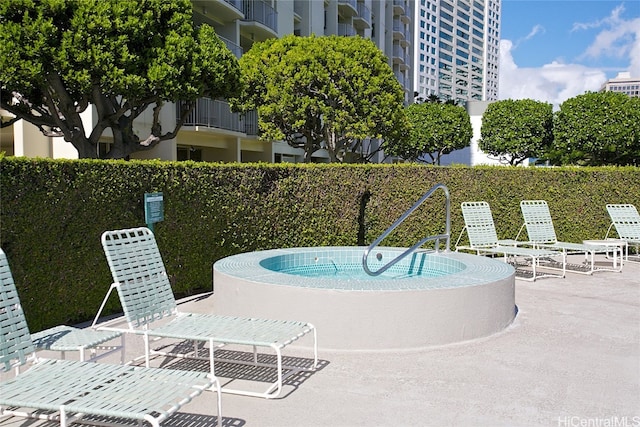 view of swimming pool featuring a patio