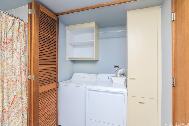 laundry room with independent washer and dryer