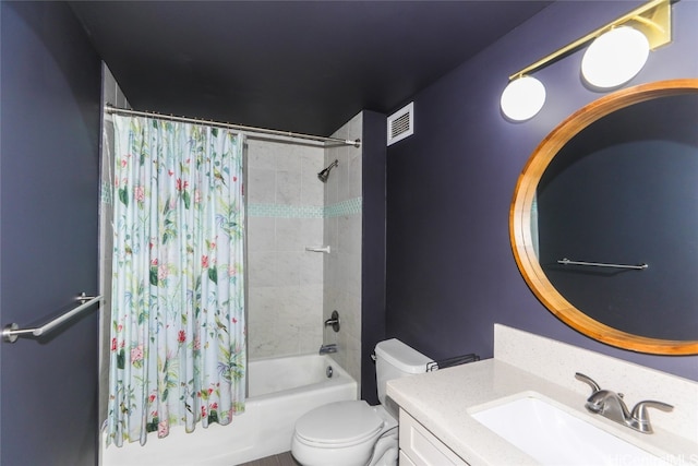 full bathroom featuring vanity, toilet, and shower / tub combo