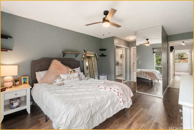 bedroom with ceiling fan and dark hardwood / wood-style floors