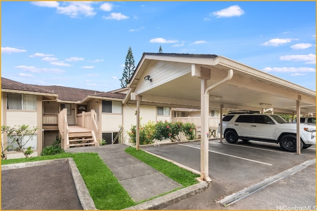 view of parking featuring a carport