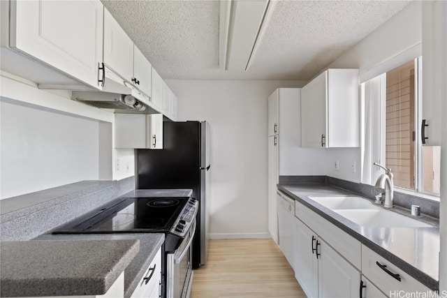 kitchen with white cabinets, a textured ceiling, stainless steel electric range oven, and sink